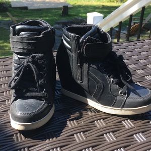 Hidden wedge sneakers.